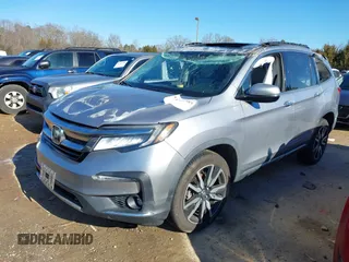 2019 Honda Pilot Touring 7-Passenger with VIN 5FNYF6H60KB038846, listed as a IAAI auction lot 41339385 with Not provided miles and . Bid and sale history available at DreamBid. Image 2.