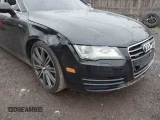 2012 Audi A7 Premium Plus with VIN WAUYGAFC0CN096027, listed as a IAAI auction lot 40881391 with 155,433 mi miles and . Bid and sale history available at DreamBid. Image 16.