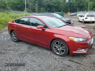 2017 Ford Fusion SE with VIN 3FA6P0H74HR197800, listed as a Copart auction lot 61042735 with 128,125 mi miles and Salvage title. Bid and sale history available at DreamBid. Image 4.