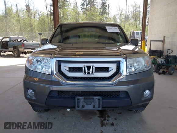 2011 Honda Pilot EX-L with VIN 5FNYF4H56BB503089, listed as a IAAI auction lot 42127543 with 144,227 mi miles. Bid and sale history available at carsss.com. Image 12.