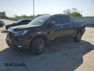 2023 Honda Ridgeline RTL-E with VIN 5FPYK3F72PB001592, listed as a Copart auction lot 52154625 with 41,153 mi miles and Salvage title. Bid and sale history available at DreamBid. Image 1.