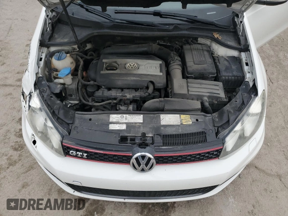 2012 Volkswagen GTI PZEV z VIN WVWED7AJ9CW107107, wystawiony jako Copart lot #43623155 z przebiegiem 193 560 mil mil oraz Szkoda całkowita • Salvage title. Historia ofert i sprzedaży dostępna na DreamBid. Obrazek 11.