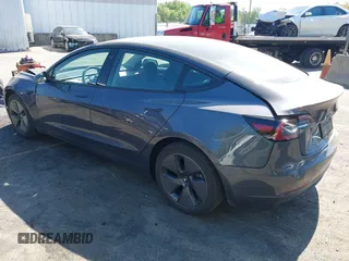 2023 Tesla Model 3 with VIN 5YJ3E1EA6PF645110, listed as a IAAI auction lot 42044357 with 24,352 mi miles and . Bid and sale history available at DreamBid. Image 3.