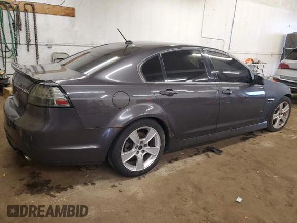2009 Pontiac G8 z VIN 6G2ER57739L205634, wystawiony jako Copart lot #58935145 z przebiegiem 181 490 mil mil oraz Czysty tytuł • Clean title. Historia ofert i sprzedaży dostępna na DreamBid. Obrazek 3.
