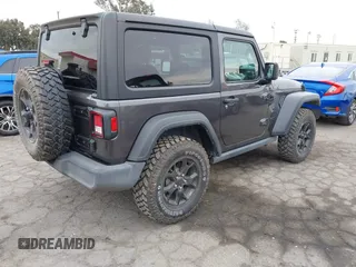 2022 Jeep Wrangler Willys Sport with VIN 1C4GJXAN7NW252931, listed as a IAAI auction lot 40972143 with 12,823 mi miles and . Bid and sale history available at DreamBid. Image 4.