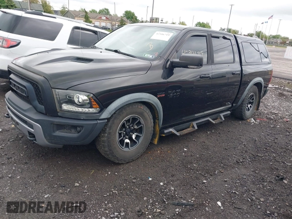 2016 Ram 1500 Rebel z VIN 1C6RR7YT0GS100285, wystawiony jako IAAI lot #42346719 z przebiegiem 103 309 mil mil oraz . Historia ofert i sprzedaży dostępna na DreamBid. Obrazek 17.