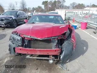 2014 Chevrolet Camaro LT z VIN 2G1FC1E31E9291298, wystawiony jako IAAI lot #41405239 z przebiegiem 122 688 mil mil oraz . Historia ofert i sprzedaży dostępna na DreamBid. Obrazek 12.
