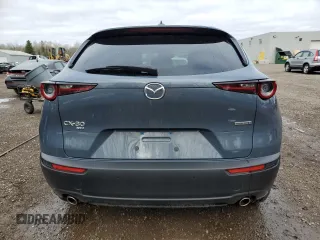 2023 Mazda CX-30 S Premium z VIN 3MVDMBDM5PM538276, wystawiony jako Copart lot #54654615 z przebiegiem 35 629 mil mil oraz Szkoda całkowita • Salvage title. Historia ofert i sprzedaży dostępna na DreamBid. Obrazek 6.
