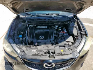 2014 Mazda CX-5 Touring with VIN JM3KE2CY5E0316077, listed as a Copart auction lot 58218735 with 190,789 mi miles and Salvage title. Bid and sale history available at DreamBid. Image 12.