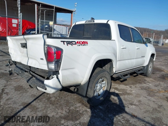 2023 Toyota Tacoma 4WD SR with VIN 3TMCZ5AN1PM538367, listed as a IAAI auction lot 41468684 with 28,879 mi miles. Bid and sale history available at carsss.com. Image 4.