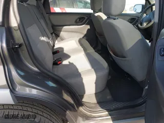 2006 Ford Escape Hybrid with VIN 1FMCU96H76KA56562, listed as a IAAI auction lot 42096713 with 148,963 mi miles. Bid and sale history available at carsss.com. Image 8.
