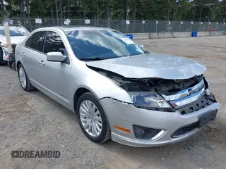 2012 Ford Fusion Hybrid с VIN 3FADP0L35CR440051, выставлен на аукционе IAAI как лот 42644284 с пробегом 89 087 миль миль и . История ставок и продаж доступна на DreamBid. Изображение 1.