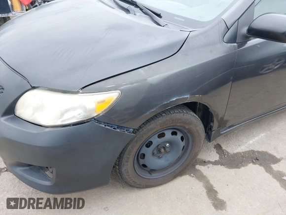2009 Toyota Corolla with VIN 1NXBU40E49Z165082, listed as a IAAI auction lot 41881134 with 261,282 mi miles. Bid and sale history available at carsss.com. Image 6.