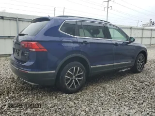 2021 Volkswagen Tiguan SE z VIN 3VV2B7AX3MM154049, wystawiony jako Copart lot #52961955 z przebiegiem 77 349 mil mil oraz Czysty tytuł • Clean title. Historia ofert i sprzedaży dostępna na DreamBid. Obrazek 3.