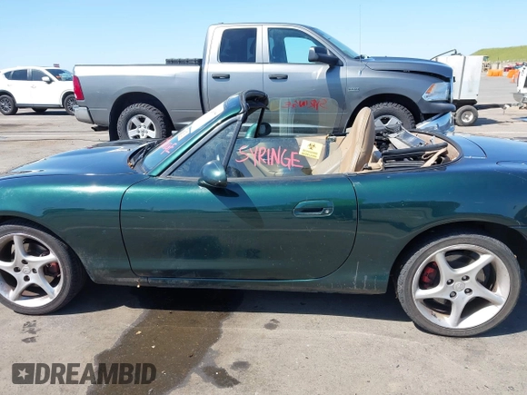 2001 Mazda MX-5 Miata with VIN JM1NB353410203981, listed as a IAAI auction lot 42028077 with Not Provided miles and . Bid and sale history available at DreamBid. Image 14.