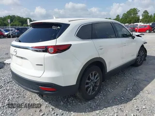 2022 Mazda CX-9 Touring with VIN JM3TCBCY4N0604912, listed as a IAAI auction lot 42456794 with 49,853 mi miles and . Bid and sale history available at DreamBid. Image 4.