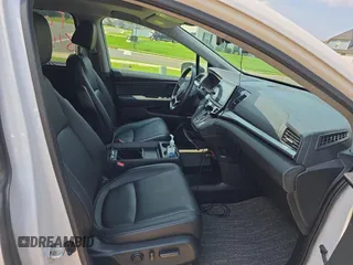 2023 Honda Odyssey EX-L z VIN 5FNRL6H67PB013527, wystawiony jako Copart lot #59705385 z przebiegiem 12 262 mil mil oraz Czysty tytuł • Clean title. Historia ofert i sprzedaży dostępna na DreamBid. Obrazek 5.