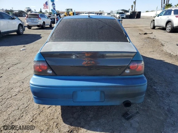 2002 Mitsubishi Lancer OZ-Rally with VIN JA3AJ86E62U070034, listed as a Copart auction lot 86914144 with 180,675 mi miles and Salvage Title. Bid and sale history available at carsss.com. Image 6.