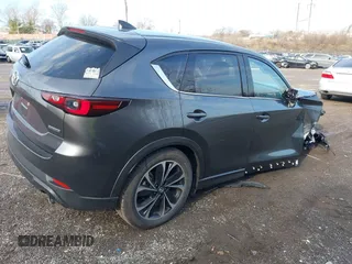 2023 Mazda CX-5 2.5 S Premium Package with VIN JM3KFBDM2P0246520, listed as a IAAI auction lot 41100226 with 9,537 mi miles. Bid and sale history available at carsss.com. Image 4.