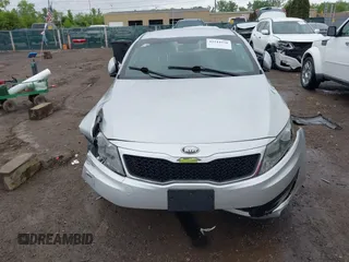 2013 Kia Optima LX z VIN KNAGM4A75D5431221, wystawiony jako IAAI lot #42244970 z przebiegiem 138 157 mil mil oraz . Historia ofert i sprzedaży dostępna na DreamBid. Obrazek 13.