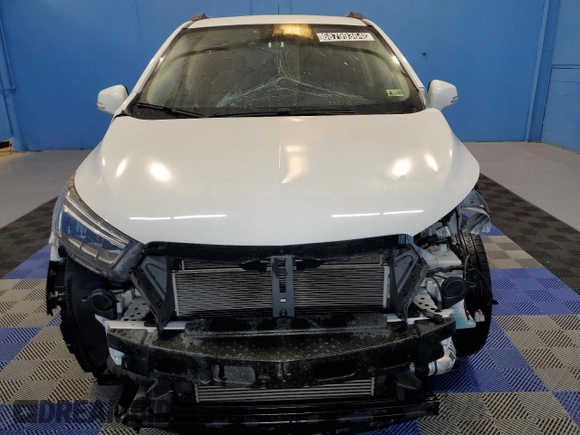 2019 Buick Encore Essence with VIN KL4CJGSM0KB895977, listed as a Copart auction lot 68799364 with 57,052 mi miles and Clean Title. Bid and sale history available at DreamBid. Image 5.