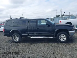 2004 Dodge Dakota SLT with VIN 1D7HG42N94S618531, listed as a IAAI auction lot 41741467 with 202,422 mi miles. Bid and sale history available at carsss.com. Image 13.