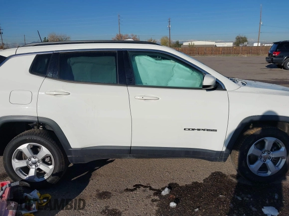 2019 Jeep Compass Latitude with VIN 3C4NJDBB5KT704564, listed as a IAAI auction lot 40768531 with 95,291 mi miles. Bid and sale history available at carsss.com. Image 13.