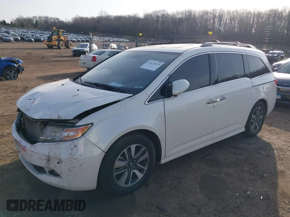2014 Honda Odyssey Touring with VIN 5FNRL5H97EB037358, listed as a IAAI auction lot 41832825 with 208,894 mi miles and . Bid and sale history available at DreamBid. Image 17.