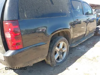 2010 Chevrolet Suburban LT with VIN 1GNUCJE0XAR144358, listed as a IAAI auction lot 41803071 with Not Provided miles and . Bid and sale history available at DreamBid. Image 21.