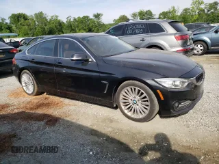 2015 BMW 4 Series 428i with VIN WBA4A5C50FD410198, listed as a Copart auction lot 55448345 with 137,042 mi miles and Clean title. Bid and sale history available at DreamBid. Image 4.