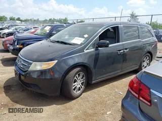 2011 Honda Odyssey EX-L with VIN 5FNRL5H62BB063125, listed as a IAAI auction lot 42562541 with 140,787 mi miles and . Bid and sale history available at DreamBid. Image 17.
