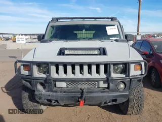 2003 Hummer H2 with VIN 5GRGN23U13H128617, listed as a IAAI auction lot 41494349 with 135,295 mi miles. Bid and sale history available at carsss.com. Image 12.