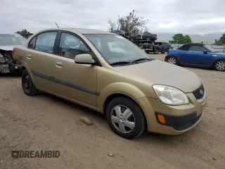 2009 Kia Rio LX with VIN KNADE223496549097, listed as a Copart auction lot 54375975 with 140,882 mi miles and Salvage Title. Bid and sale history available at DreamBid. Image 4.
