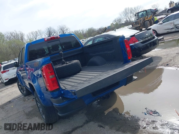 2021 Chevrolet Colorado 4WD Z71 z VIN 1GCGTDEN4M1212479, wystawiony jako IAAI lot #41937713 z przebiegiem 56 164 mil mil oraz . Historia ofert i sprzedaży dostępna na DreamBid. Obrazek 3.