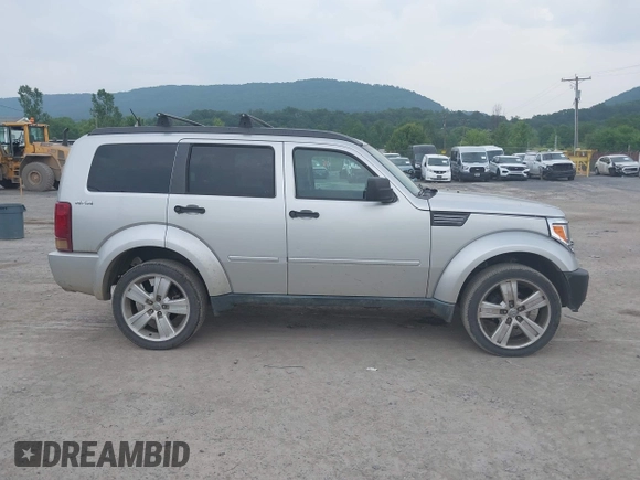 2011 Dodge Nitro Heat with VIN 1D4PU4GK1BW598734, listed as a IAAI auction lot 42498891 with 88,444 mi miles and . Bid and sale history available at DreamBid. Image 13.