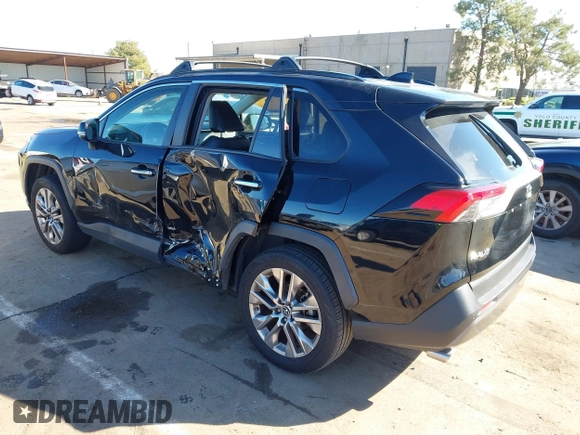2019 Toyota RAV4 Limited with VIN JTMN1RFV5KD506624, listed as a IAAI auction lot 41657432 with 93,416 mi miles. Bid and sale history available at carsss.com. Image 3.