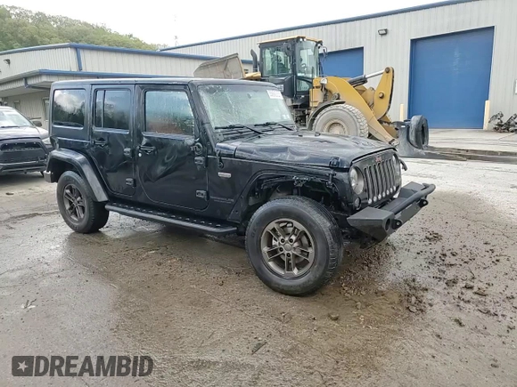 2016 Jeep Wrangler Unlimited 75th Anniversary with VIN 1C4HJWEG3GL198641, listed as a Copart auction lot 55892035 with 128,702 mi miles and Salvage title. Bid and sale history available at DreamBid. Image 15.