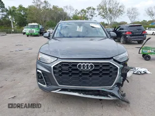 2023 Audi Q5 S line Premium Plus z VIN WA1EAAFY6P2161080, wystawiony jako IAAI lot #41282613 z przebiegiem 20 268 mil mil oraz . Historia ofert i sprzedaży dostępna na DreamBid. Obrazek 12.