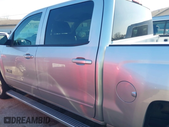 2015 Chevrolet Silverado 1500 LT with VIN 3GCPCREH0FG152809, listed as a IAAI auction lot 41573835 with 213,410 mi miles and . Bid and sale history available at DreamBid. Image 14.