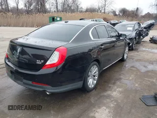 2014 Lincoln MKS with VIN 1LNHL9EK7EG609329, listed as a IAAI auction lot 41555819 with 89,849 mi miles. Bid and sale history available at carsss.com. Image 4.