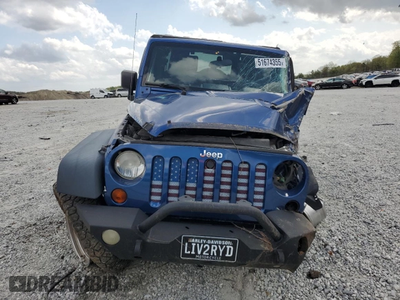 2009 Jeep Wrangler Unlimited Rubicon with VIN 1J4GA69169L762992, listed as a Copart auction lot 51674355 with 147,181 mi miles and Salvage title. Bid and sale history available at DreamBid. Image 5.
