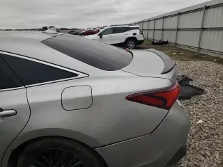 2021 Toyota Avalon Hybrid XSE z VIN 4T1EA1ABXMU007816, wystawiony jako Copart lot #51038535 z przebiegiem 73 642 mil mil oraz Szkoda całkowita • Salvage title. Historia ofert i sprzedaży dostępna na DreamBid. Obrazek 11.