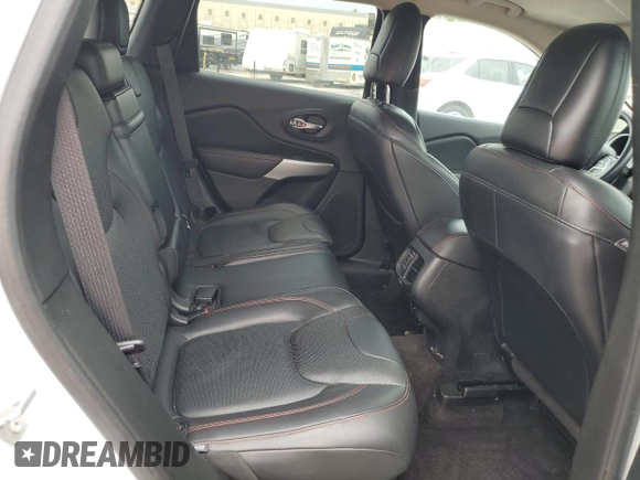 2017 Jeep Cherokee Trailhawk z VIN 1C4PJMBS3HW569628, wystawiony jako Copart lot #57105855 z przebiegiem 127 637 mil mil oraz Szkoda całkowita • Salvage title. Historia ofert i sprzedaży dostępna na DreamBid. Obrazek 11.