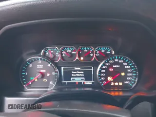 2015 Chevrolet Silverado 1500 LT with VIN 1GCVKREC9FZ237338, listed as a IAAI auction lot 41897225 with 154,229 mi miles and . Bid and sale history available at DreamBid. Image 7.
