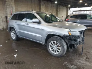 2014 Jeep Grand Cherokee Laredo with VIN 1C4RJFAG4EC156549, listed as a IAAI auction lot 41904814 with 139,262 mi miles. Bid and sale history available at carsss.com. Image 1.