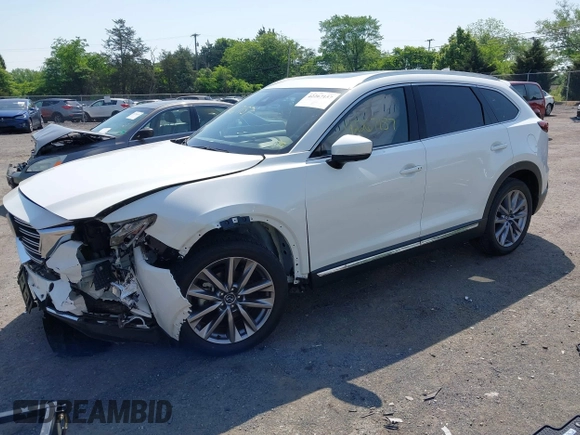 2021 Mazda CX-9 Grand Touring z VIN JM3TCBDY8M0537986, wystawiony jako IAAI lot #42267157 z przebiegiem 25 375 mil mil oraz . Historia ofert i sprzedaży dostępna na DreamBid. Obrazek 18.