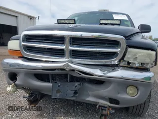 2004 Dodge Dakota SLT z VIN 1D7HG48N54S664848, wystawiony jako IAAI lot #42152635 z przebiegiem 153 824 mil mil oraz . Historia ofert i sprzedaży dostępna na DreamBid. Obrazek 6.