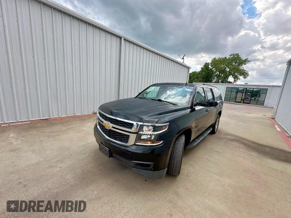 2015 Chevrolet Suburban LT with VIN 1GNSKJKC3FR153922, listed as a Copart auction lot 64337945 with 238,441 mi miles and Clean title. Bid and sale history available at DreamBid. Image 2.