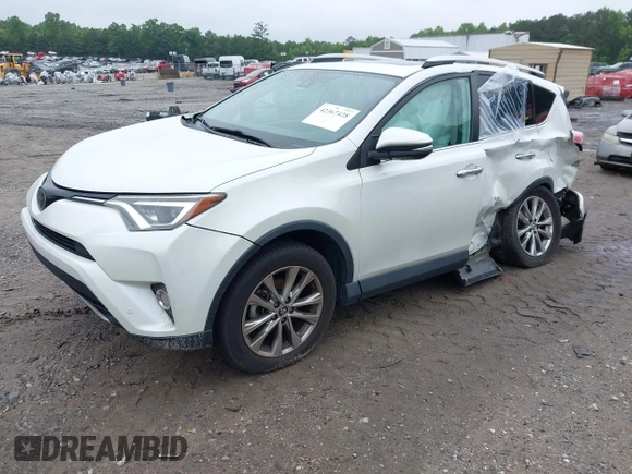 2016 Toyota RAV4 Limited with VIN 2T3YFREV6GW293418, listed as a IAAI auction lot 42367428 with 210,000 mi miles and . Bid and sale history available at DreamBid. Image 16.