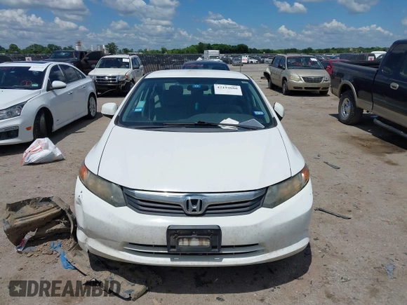 2012 Honda Civic LX z VIN 2HGFB2F57CH536142, wystawiony jako IAAI lot #42194088 z przebiegiem 108 293 mil mil oraz . Historia ofert i sprzedaży dostępna na DreamBid. Obrazek 11.